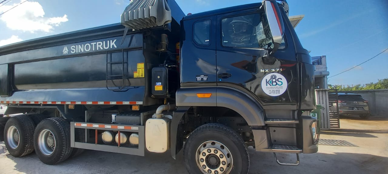 Side view of the branded KBS HOWO Sinotruk 6x4 dump truck