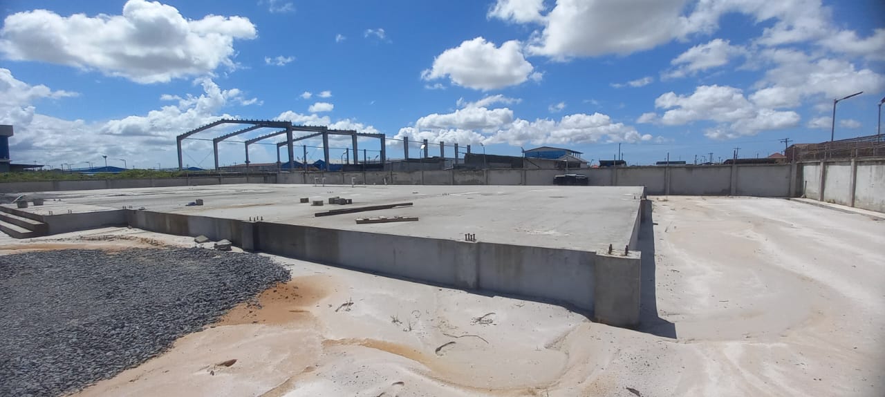 Wide view of the warehouse foundation and steel frame